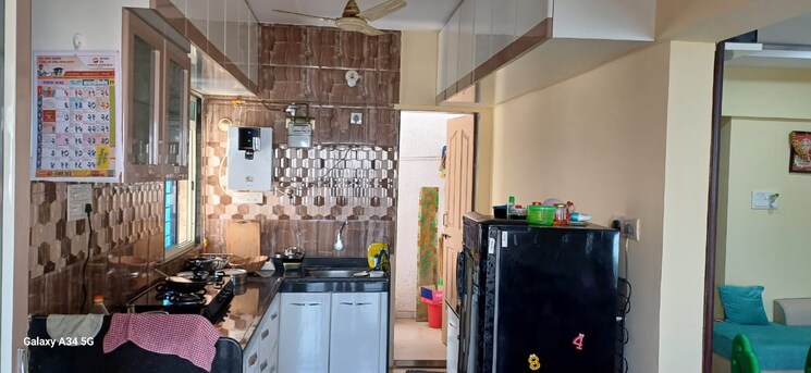 Kitchen, vaishnavi-sahil-vighnesh 2 Bedroom 982 Sq.Ft. Apartment In Wakad Pune 9744466