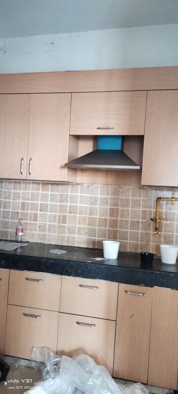 Kitchen in 2.5 BHK Apartment at Mahagun Mywoods, Sector 16c Greater Noida – for Rent