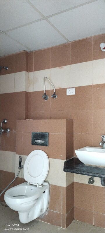 Bathroom in 3 BHK Apartment at Mahagun Mywoods, Sector 16c Greater Noida – for Rent