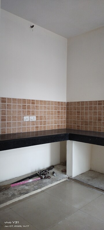 Kitchen in 3 BHK Apartment at Mahagun Mywoods, Sector 16c Greater Noida – for Rent