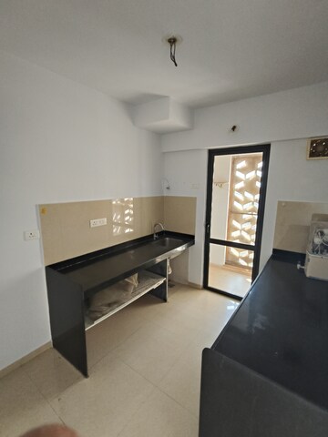 Living Room in 2 BHK Apartment at Lodha Lakeshore Greens, Dombivli East – for Rent