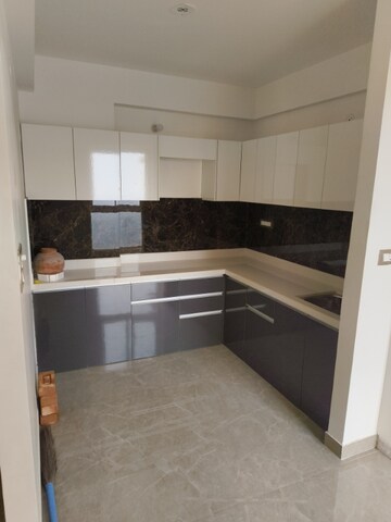 Kitchen in 3 BHK Apartment at Vardhman Empire Estate, Mahapura – for Rent