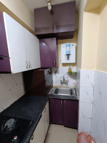 Kitchen in 2 BHK Apartment at Supertech Cape Town, Sector 74 – for Rent