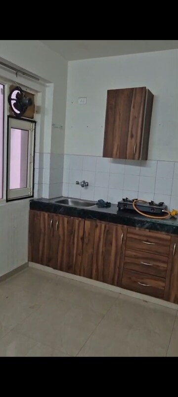 Kitchen in 2 BHK Apartment at ROF Aalayas, Sector 102 – for Rent