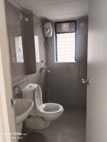 Bathroom in 1 BHK Apartment at Runwal Gardens, Dombivli East – for Rent