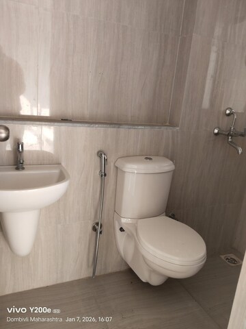 Bathroom in 2 BHK Apartment at Runwal Gardens, Dombivli East – for Rent