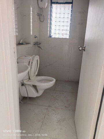 Bathroom in 2 BHK Apartment at Runwal Gardens, Dombivli East – for Rent