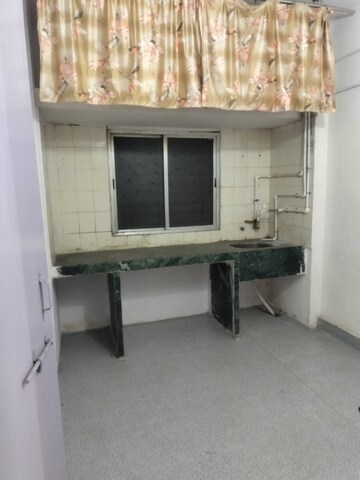 Kitchen in 1.5 BHK Apartment at Baburao Dhore Bhavan, Old Sangvi – for Rent