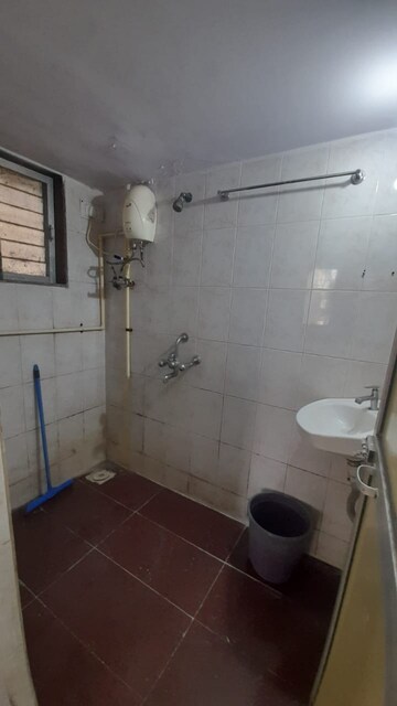 Bathroom in 1 RK Apartment at Vasant Valley Complex, Malad East – for Rent