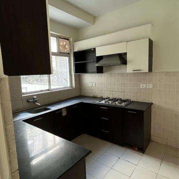 Kitchen in 3.5 BHK Builder Floor at Ansal API Esencia Wood Winds, Sector 67a – for Rent