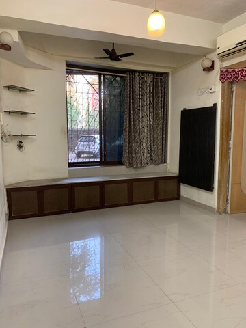Living Room in 1 BHK Apartment at Om Rishikesh CHS, Borivali West – for Rent
