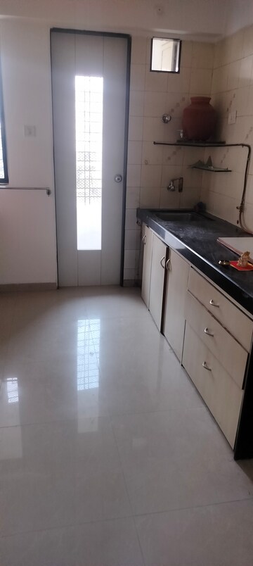 Kitchen in 2 BHK Apartment at Deep Tower, Andheri West – for Rent