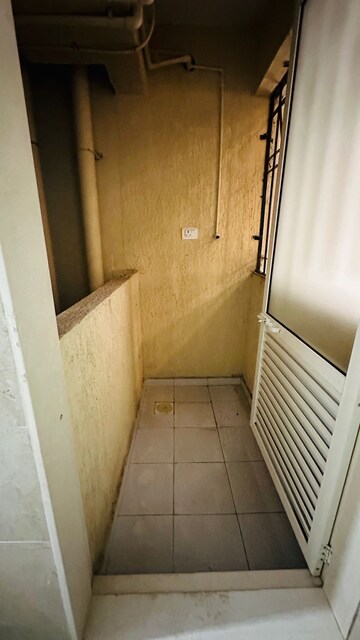 Bathroom in 2 BHK Apartment at Dosti West County, Balkum Pada – for Sale