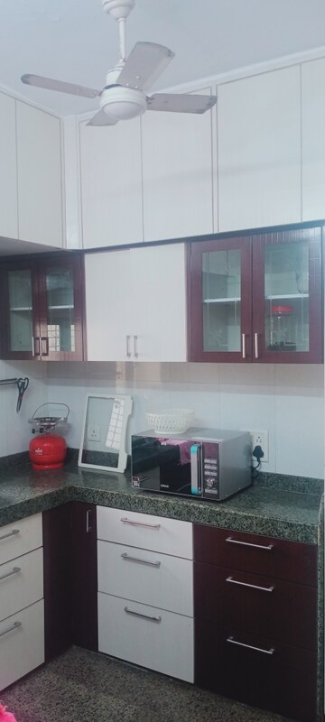 Kitchen in 2 BHK Apartment at Takshila CHS, Andheri East – for Rent