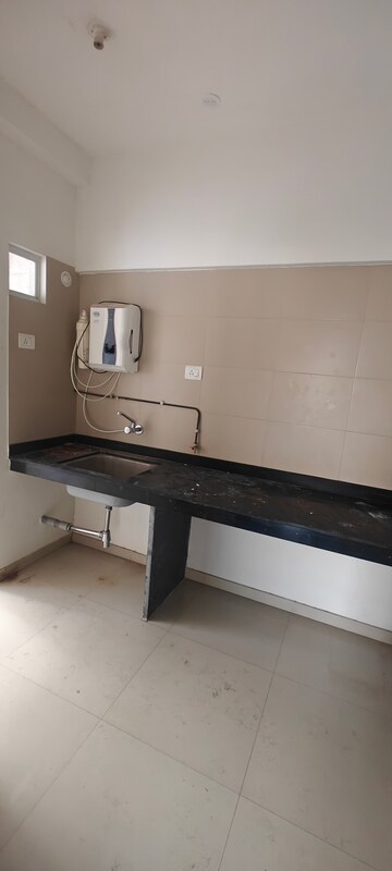 Kitchen in 1 BHK Apartment at Godrej Prana, Undri – for Sale