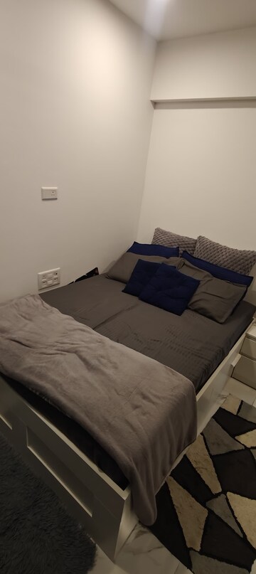 Bedroom in 2 BHK Apartment at Dev Leo Tower, Oshiwara – for Rent