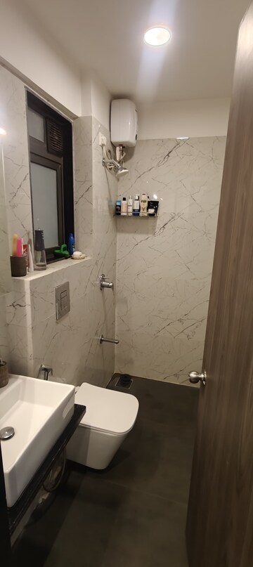 Bathroom in 2 BHK Apartment at Dev Leo Tower, Oshiwara – for Rent