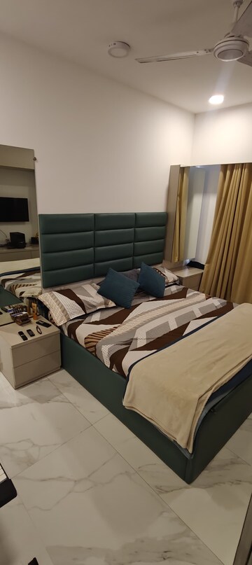 Bedroom in 2 BHK Apartment at Dev Leo Tower, Oshiwara – for Rent