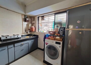 Kitchen in 3 BHK Apartment at Pearl Prabha Apartment, Andheri West – for Sale