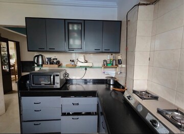 Kitchen in 3 BHK Apartment at Pearl Prabha Apartment, Andheri West – for Sale