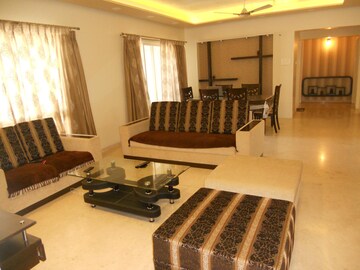 Living Room in 4 BHK Apartment at Kolte Patil 24K Glitterati, Pimple Nilakh – for Rent