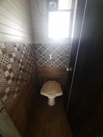 Bathroom in 2 BHK Apartment at Raunak Unnathi Woods Phase 4 And 5, Ghodbunder Road – for Rent