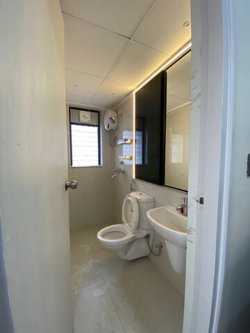 Bathroom in 1 BHK Apartment at Runwal Gardens Phase 3, Dombivli East – for Rent
