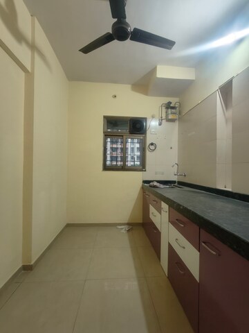 Kitchen in 1.5 BHK Apartment at Dosti Vihar, Samata Nagar – for Rent