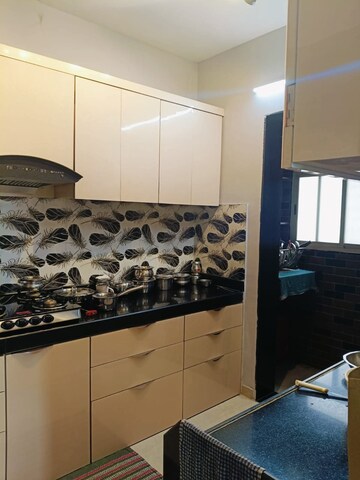 Kitchen in 1 BHK Apartment at Nagesh  Tower, Vishnu Nagar – for Rent