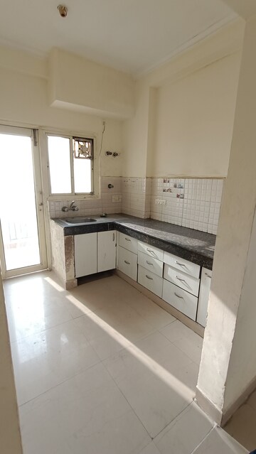 Kitchen in 2 BHK Apartment at Antriksh Golf View, Sector 78 – for Rent