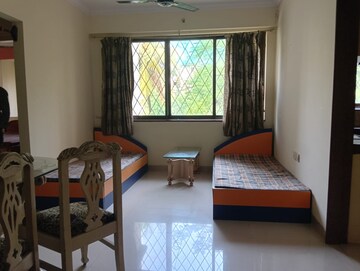 Living Room in 2 BHK Apartment at Kalpataru Classic, Malad West – for Rent