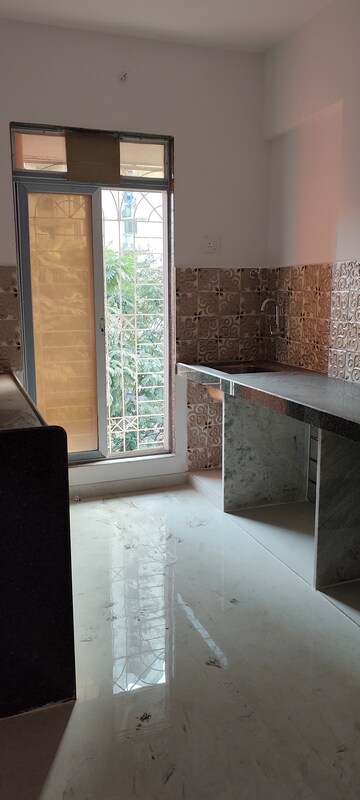 Kitchen in 1 BHK Apartment at Shree Partha, Kasarvadavali – for Rent