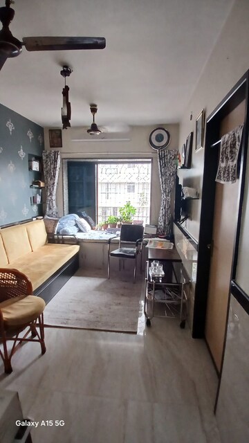 Living Room in 1 BHK Apartment at Yash Laxman Niwas, Malad West – for Rent