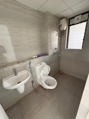 Bathroom in 1 BHK Apartment at Runwal Gardens Phase I, Dombivli East – for Rent