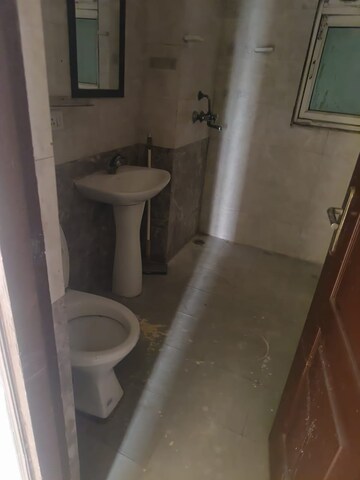 Bathroom in 2 BHK Apartment at Aims Golf Avenue II, Sector 75 – for Rent