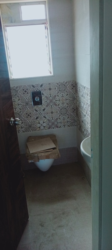 Bathroom in 1 BHK Apartment at Bindra Complex, Andheri East – for Sale