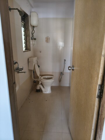 Bathroom in 2 BHK Apartment at Raj Paradise B Wing CHS Ltd, Andheri East – for Rent