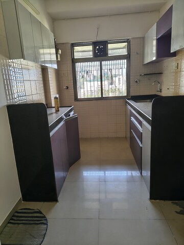 Kitchen in 2 BHK Apartment at Raj Paradise B Wing CHS Ltd, Andheri East – for Rent