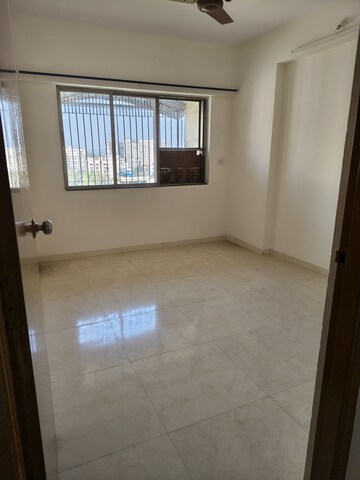 Room in 2 BHK Apartment at Raj Paradise B Wing CHS Ltd, Andheri East – for Rent