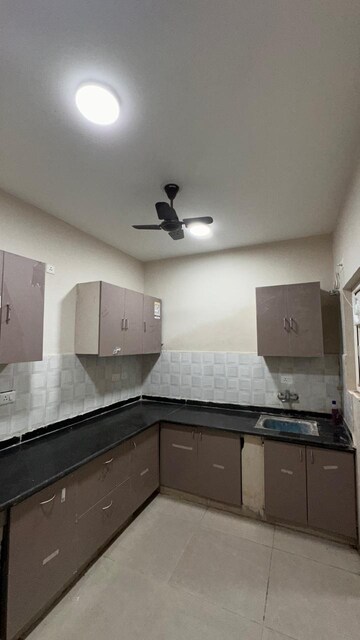 Kitchen in 2 BHK Apartment at Shri Radha Sky Park, Sector 16b Greater Noida – for Rent