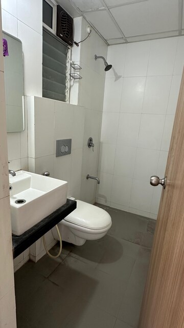Bathroom in 1 BHK Apartment at Raunak Heights, Ghodbunder Road – for Rent