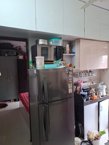 Kitchen in 1 BHK Apartment at Raunak Delight, Owale – for Rent