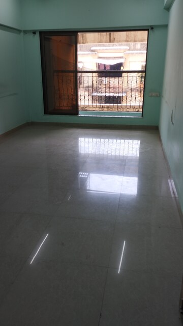 Living Room in 1 BHK Apartment at Vighnahatra Modern Enclave, Agripada – for Sale