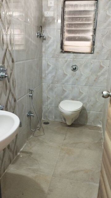 Bathroom in 1 BHK Apartment at Vighnahatra Modern Enclave, Agripada – for Sale