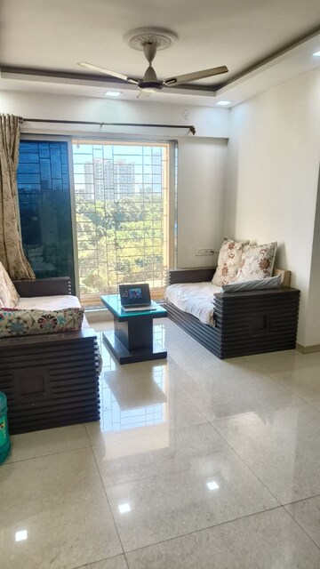 Living Room in 1 BHK Apartment at Raunak Heights, Ghodbunder Road – for Rent