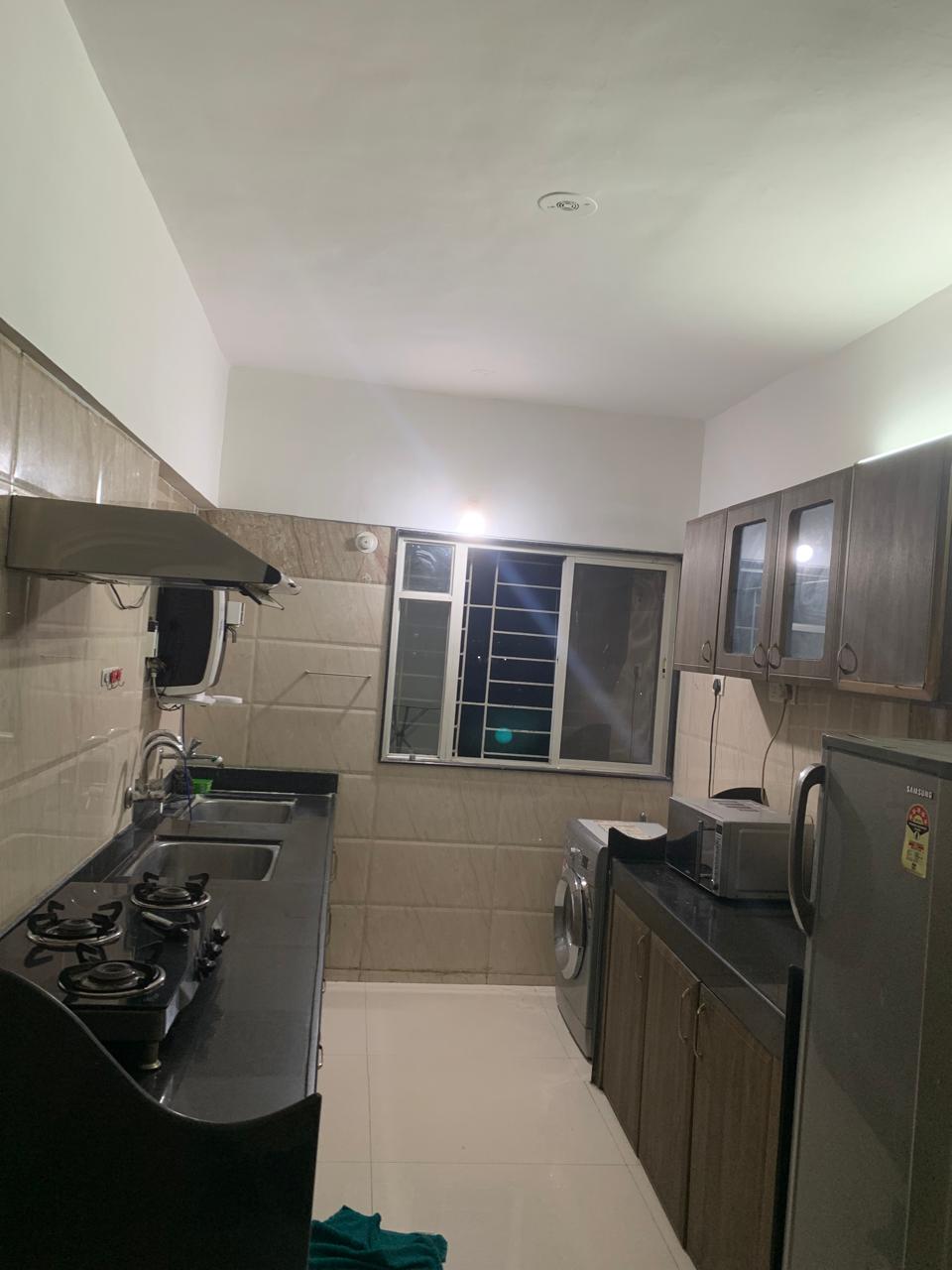 Kitchen in 2 BHK Apartment at GK Rose Woods, Pimple Saudagar – for Rent