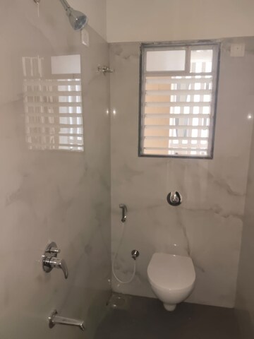 Bathroom in 1 BHK Apartment at Raunak Delight, Owale – for Rent