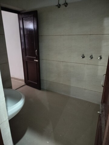 Bathroom in 3 BHK Builder Floor at Dhakoli – for Sale