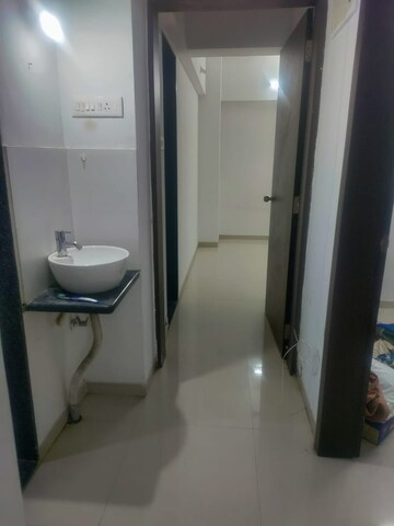 Bathroom in 2 BHK Apartment at Mantra Insignia, Mundhwa – for Rent
