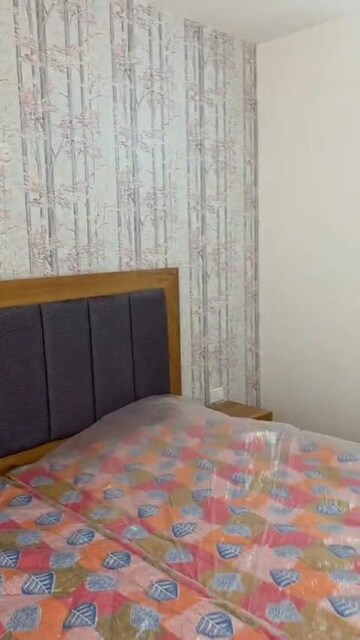 Bedroom in 3 BHK Apartment at Tulsiani Urban Woods, Sushant Golf City – for Rent